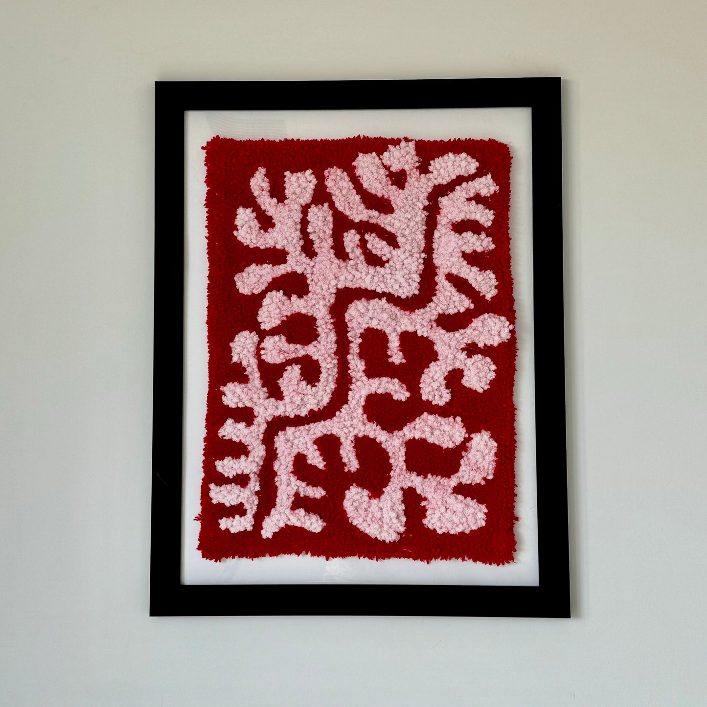 Coral tufted frame